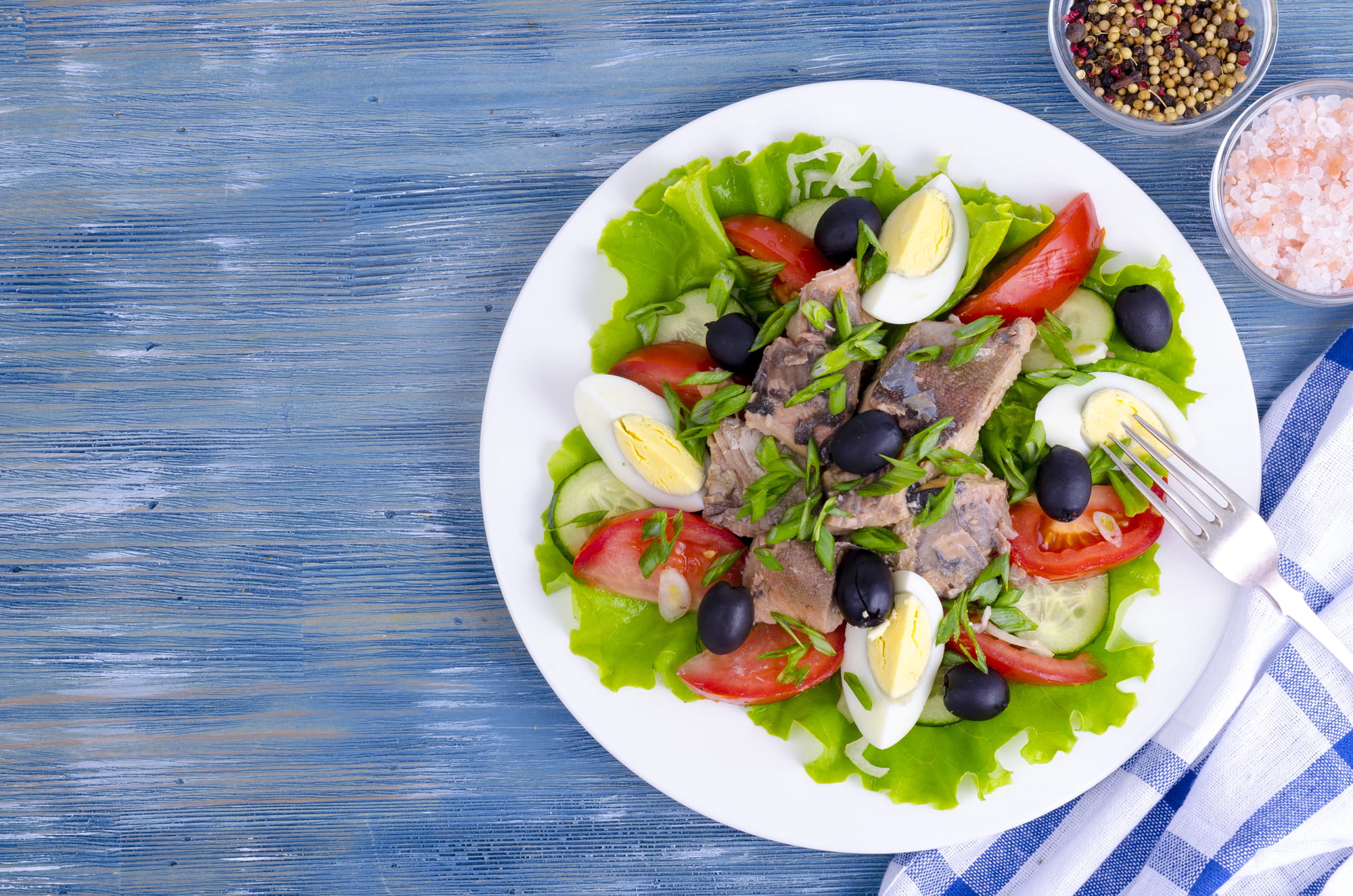 Salade Nicoise with vegetables, egg, canned fish and olives